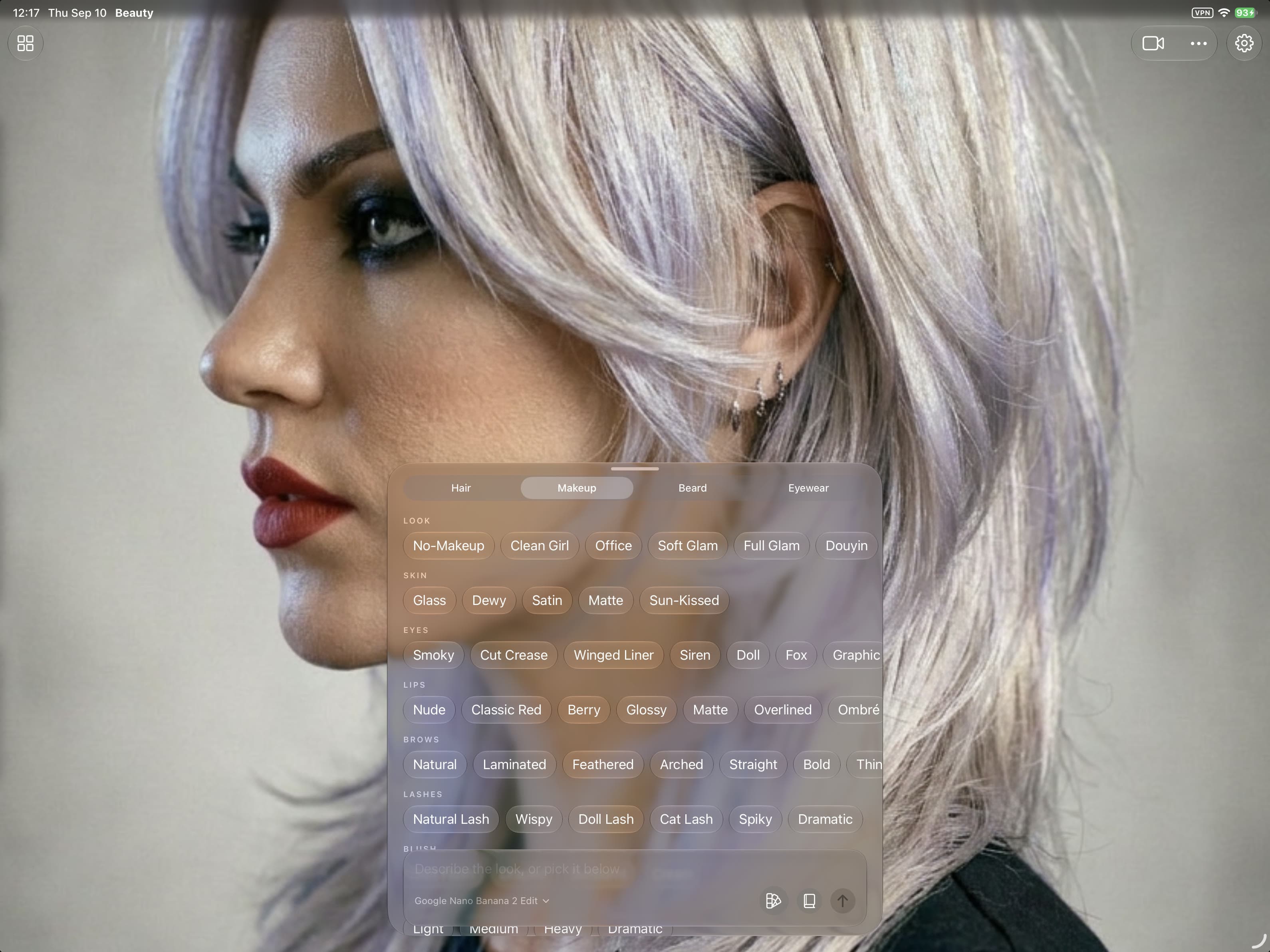 Veyra on an iPad: a long platinum cut filling the screen, with the makeup book open over it — look, skin, eyes, lips, brows and lashes all visible at once.